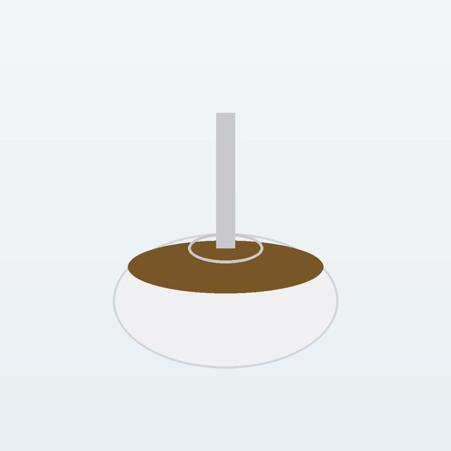 Mushroom hojicha powder with whisk in a bowl